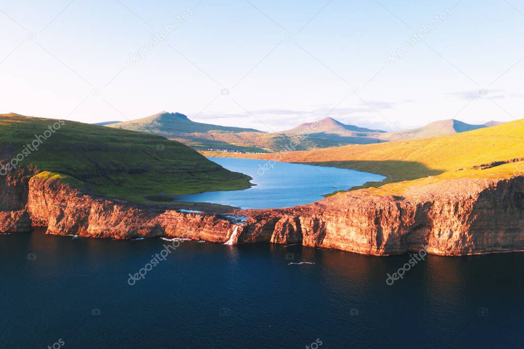 Sorvagsvatn lake on cliffs of Vagar island in sunset, Faroe Islands