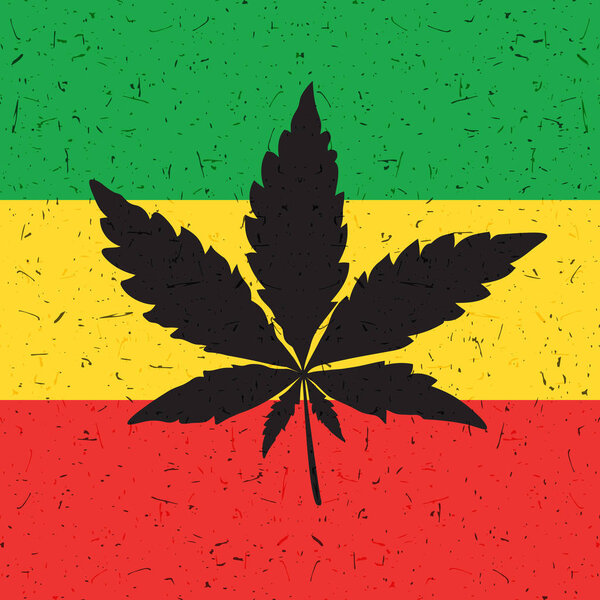 Cannabis leaf on grunge rastafarian flag.