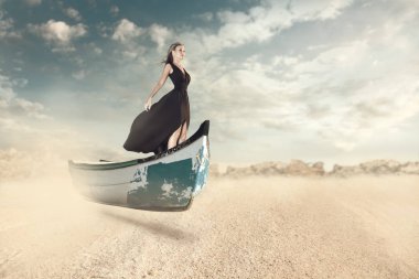 Fantasy portrait of young woman in the boat clipart