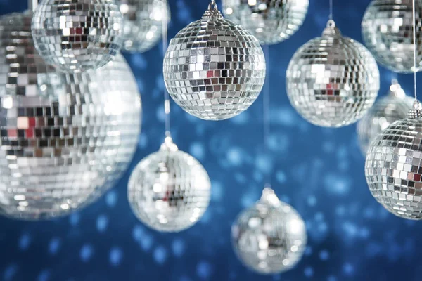 Disco balls over blue background — Stock Photo, Image