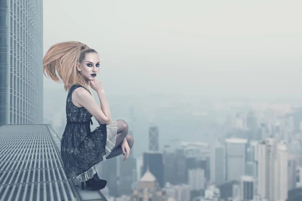 Sad fashion model on the rooftop — Stock Photo, Image