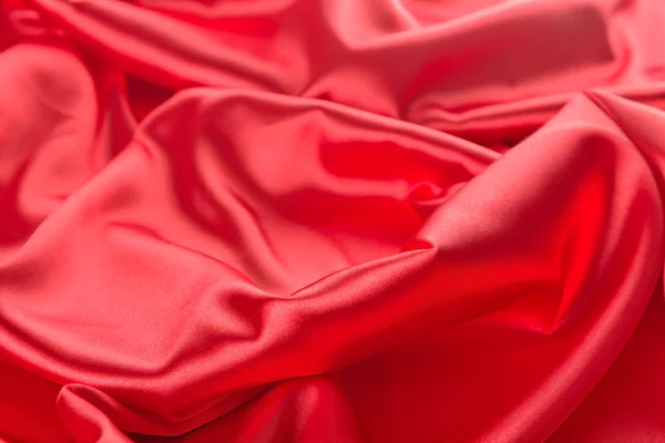 Abstract red satin fabric background — Stock Photo, Image