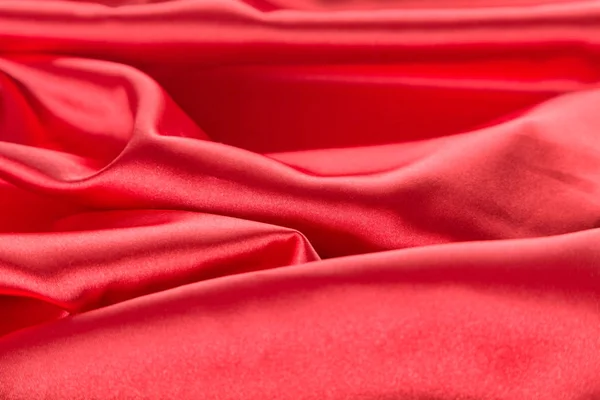 Abstract red satin fabric background — Stock Photo, Image