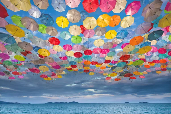 Abstract design of umbrellas flying in the sky — Stock Photo, Image