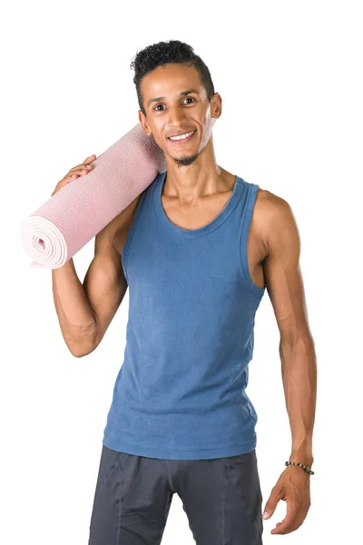 Young man holding yoga mat — Stock Photo, Image