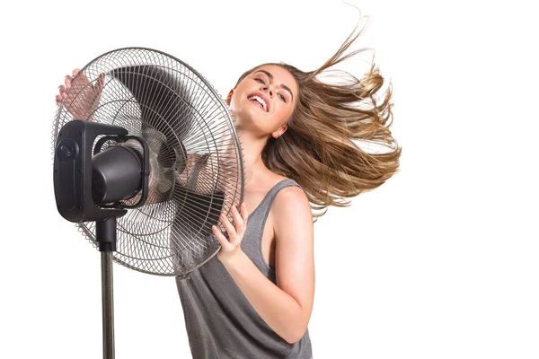 Mujer joven con ventilador más fresco —  Fotos de Stock