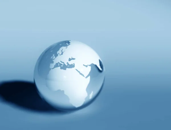 Mundo globo azul vidrio —  Fotos de Stock