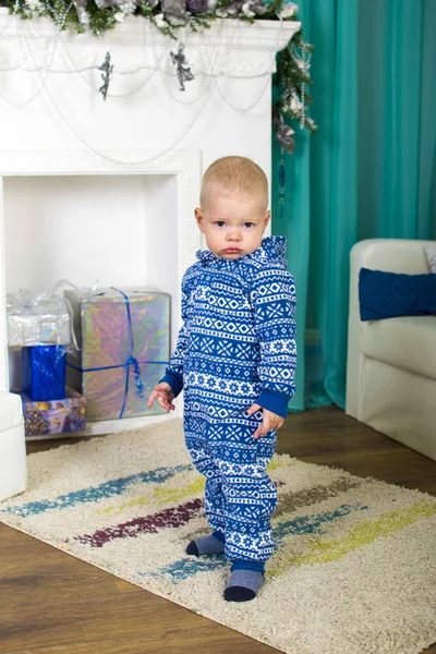 Little boy with the packaged gift — Stock Photo, Image