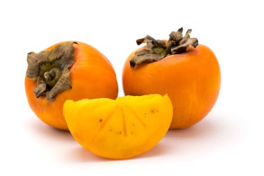 bir beyaz üzerinde olgunlaşmış Trabzon hurması