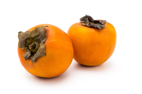 Two ripe persimmon close up — Stock Photo, Image