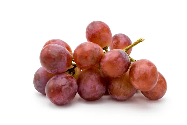 Uvas vermelhas maduras em um branco — Fotografia de Stock