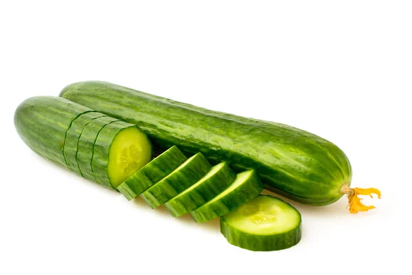Sliced fresh cucumber on a white — Stock Photo, Image