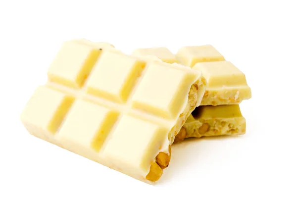 White chocolate with nuts on white — Stock Photo, Image