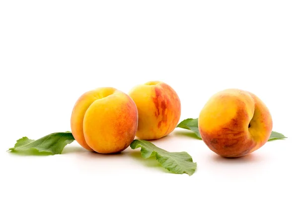 Ripe apricots on a white — Stock Photo, Image