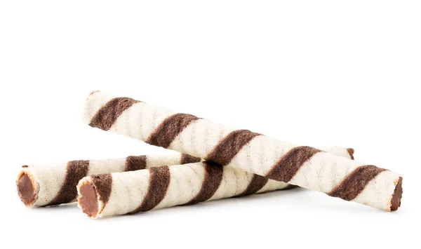 Tubos de waffle com recheio de chocolate em um fundo branco. Isolados — Fotografia de Stock