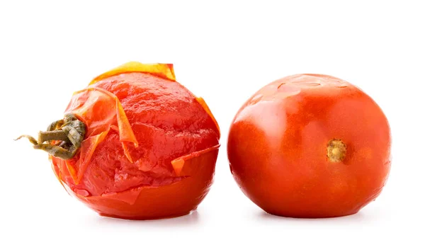 Two pickled tomatoes on a white background. Isolated — Stock Photo, Image