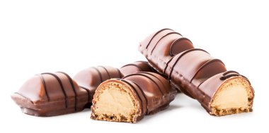Waffle sticks in chocolate with filling on a white background. Isolated