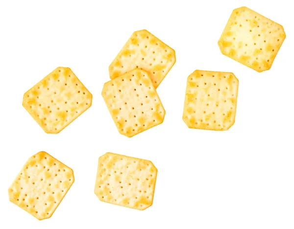 Rectangular crackers fly on a white background. — ストック写真