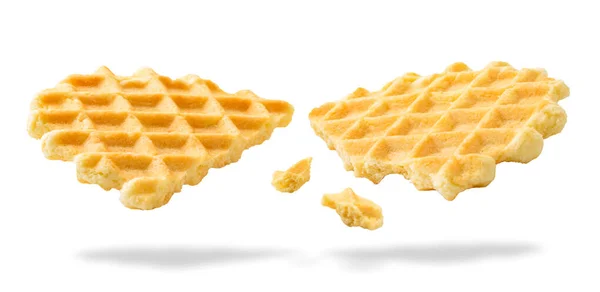 Waffle cookies are broken in half, close-up. Isolated — 스톡 사진