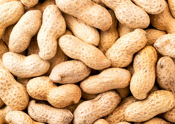 Erdnüsse in einer Schale. die Aussicht von oben. Erdnüsse als Hintergrund — Stockfoto