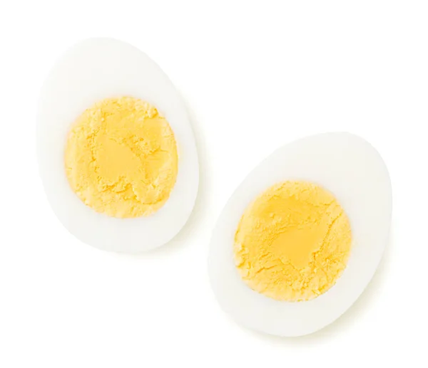 Two halves of a boiled egg on a white. The view from the top — Stock Photo, Image