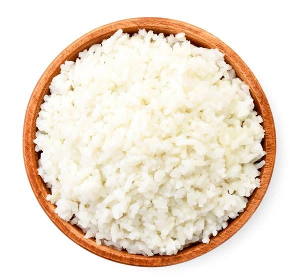 Cooked rice in a wooden plate on a white. The view from the top — Stock Photo, Image