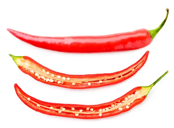 Pimenta vermelha quente e duas metades em um fundo branco. A vista de cima . — Fotografia de Stock