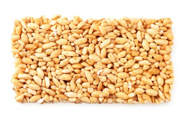 Beyaz arka planda pirinç kabartması. Yukarıdan görünüm