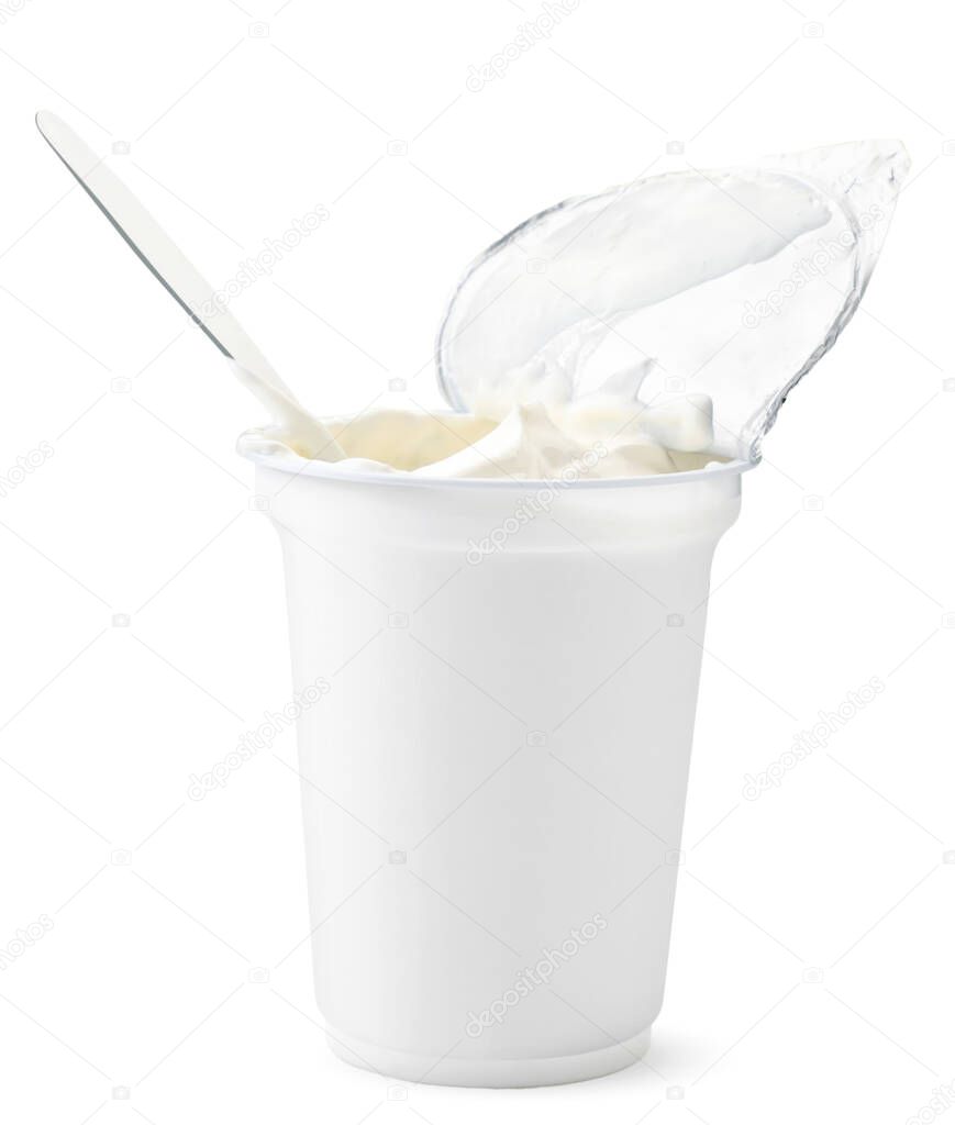 Sour cream in packaging close-up on a white background. Isolated