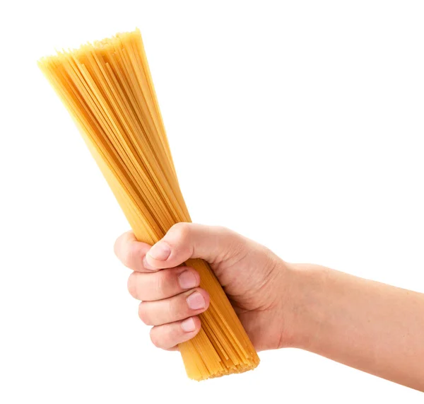 白い背景に手をクローズアップでスパゲティパスタ — ストック写真