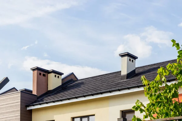 House with a flexible tile roof.