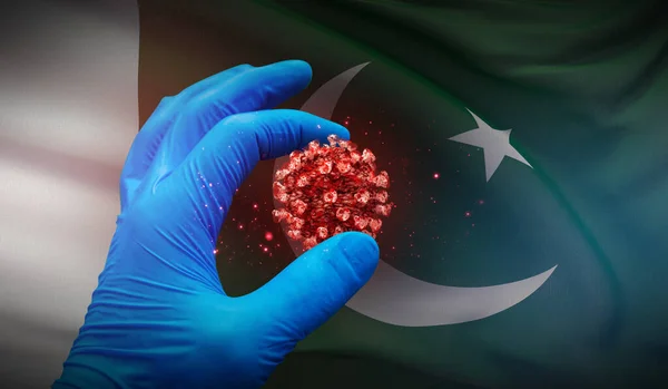 의료용 장갑을 끼고 있는 손에는 파키스탄의 국기 위에 분자, 의학적 개념이 들어 있습니다. 3D 삽화. — 스톡 사진