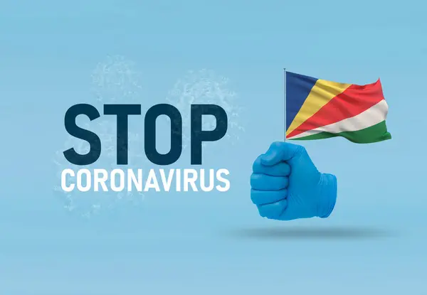 COVID-19 Visual concept - hand-text Stop Coronavirus, hand-gesture versus virus infection, clenched fist holds flag of Seychelles. Pandemic 3D illustration. — Stock Photo, Image