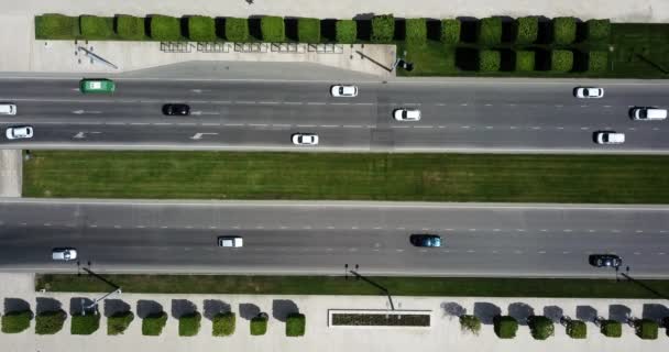 Top down aerial city view of freeway busy city road traffic jam highway. — Stock Video