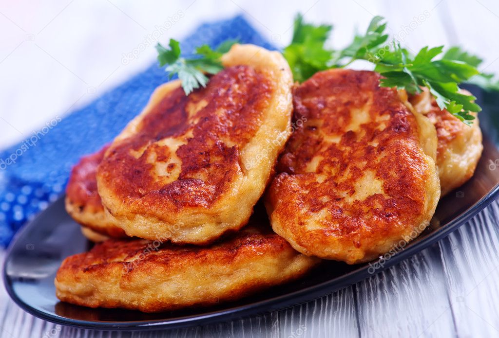 cutlets on black plate 