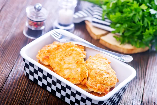 Chicken cutlets in bowl — Stock Photo, Image