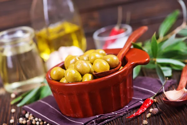 Green olives in bowl — Stock Photo, Image