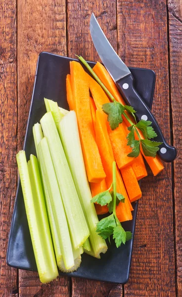 Carota tagliata con sedano — Foto Stock