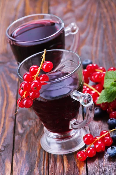 Juice from berries in glasses — Stock Photo, Image