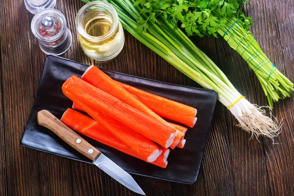 Crab sticks on plate — Stock Image Crab sticks on plate Royalty Free Stock Photos