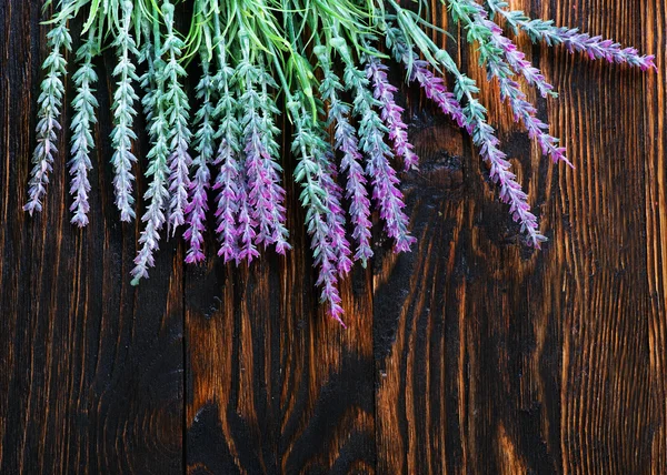 Lavender on wooden table — Stock Photo, Image