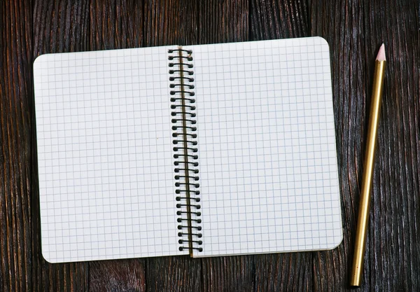 Empty notebook on wooden table — Stock Photo, Image