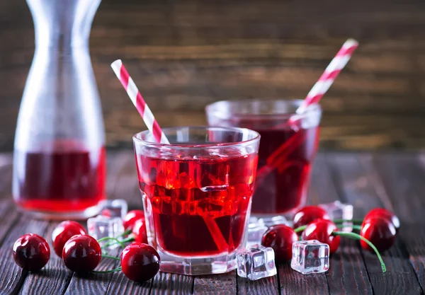 Cherry drink in glasses — стоковое фото