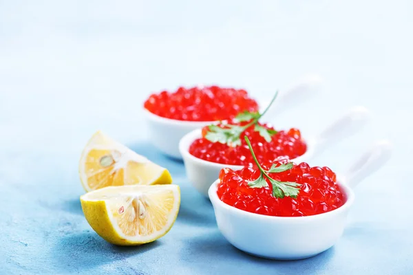 Red salmon caviar in bowls — Stock Photo, Image