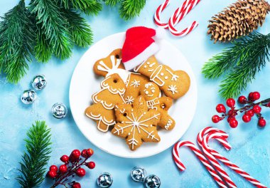 cookies and candy canes on a table clipart