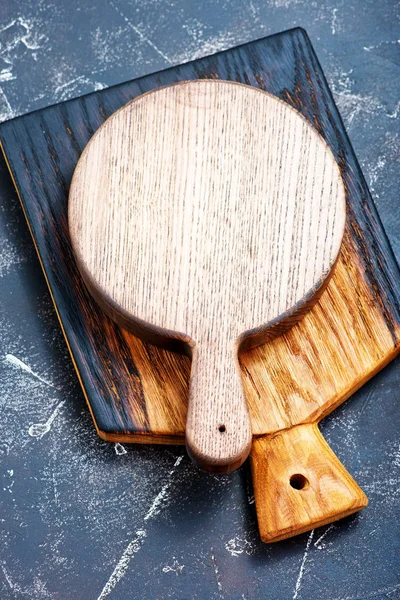 Tablas de madera, sobre una mesa — Foto de Stock