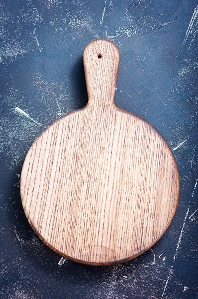 wooden board, on a table