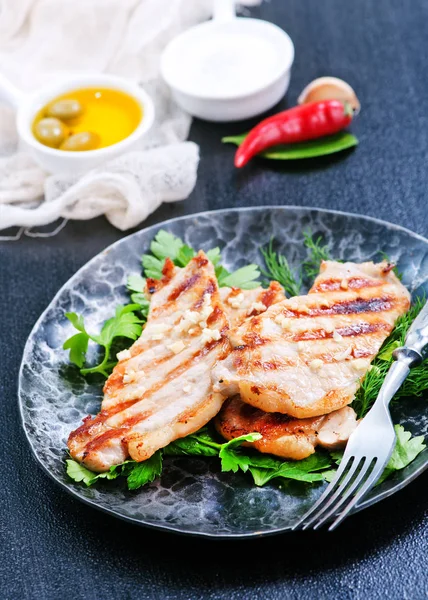 Fried meat on plate Stock Picture