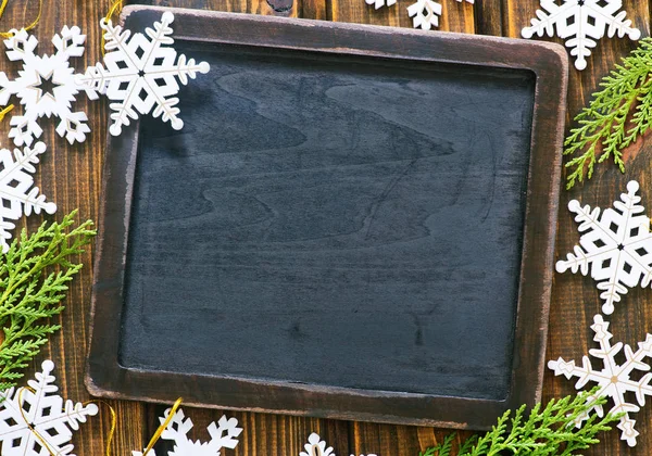 Christmas decorations and black board for notes — Stock Photo, Image