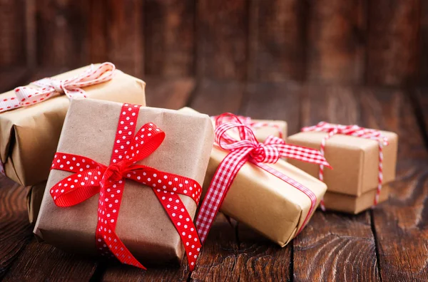 Boxes for presents with colorful ribbons — Stock Photo, Image